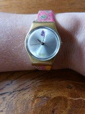 Petite montre SWATCH,  pile