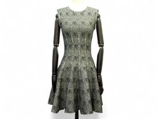 ROBE ALAIA PATINEUSE EN LAINE 38 ECRUE ET POINTS NOIRS SHORT SKATER DRESS 2400€