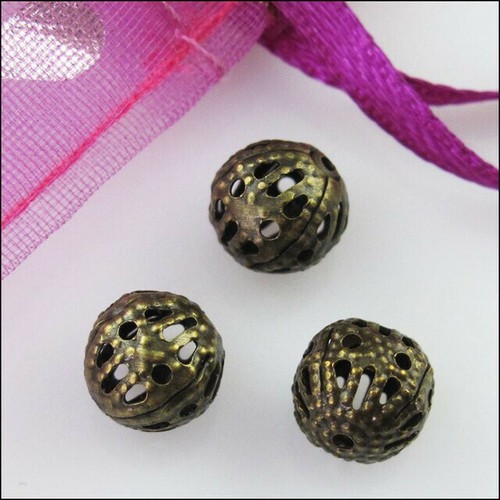 Perle 6mm filigrane bronze - 50,