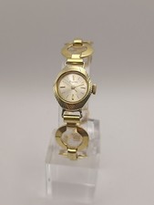 Montre Dugena plaque or mécanique