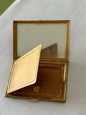 Ancien poudrier de sac à mains en métal doré décor soleil Patrys Paris