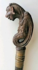 superbe ancienne canne en acajou joli pommeau sculpté  décor de faune 19éme