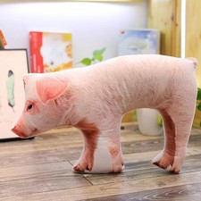 Poupée cochon en peluche