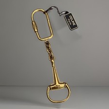 Porte-clés breloque dorée