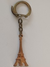 Porte clé vintage, années 60, TOUR EIFFEL figurine plate métal doré