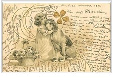 CHIENS.FILLETTE AVEC SON GROS CHIEN ET SES PETITS DANS UNE CORBEILLE.TREFLE DO