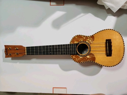 Solid wood ukulele hand - wood, made