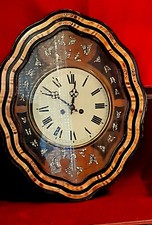 Ancienne pendule œil de bœuf avec incrustation nacre Antiquité