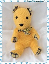 Doudou Ours Assis Jaune Nœud Oreilles Pattes Carreaux Jaune Et Bleu Nounours