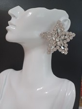 Alessandra RICH- Boucles d'oreilles à clipser "étoiles".