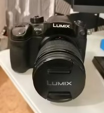 Panasonic Lumix GH4 + Premium Expert Kit (Objectif 12-60 + Micro Rode , etc..)