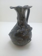 joli pichet en etain art