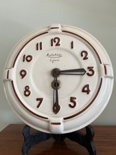 Horloge céramique murale Lutetia  années 50/60 diamètre 23cm Mouvement 8jours 