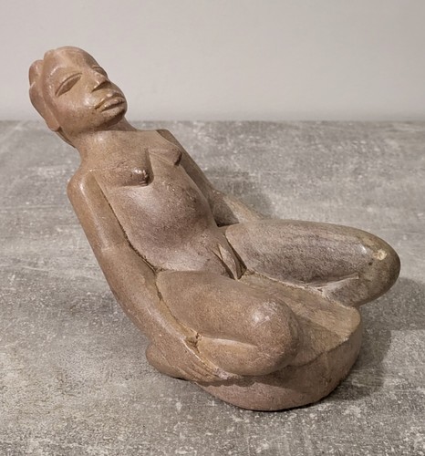 Sculpture pierre mbigou - en,