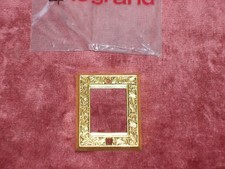 Plaque Enjoliveur métal Doré