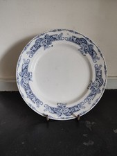 Assiette en faïence Creil &