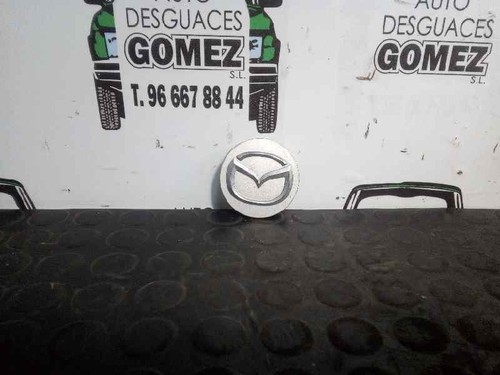 2477c2512 enjoliveur mazda - mazda, 323