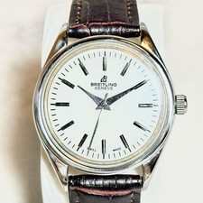 Rare montre vintage BREITLING GENEVE à remontage manuel cadran blanc acier...