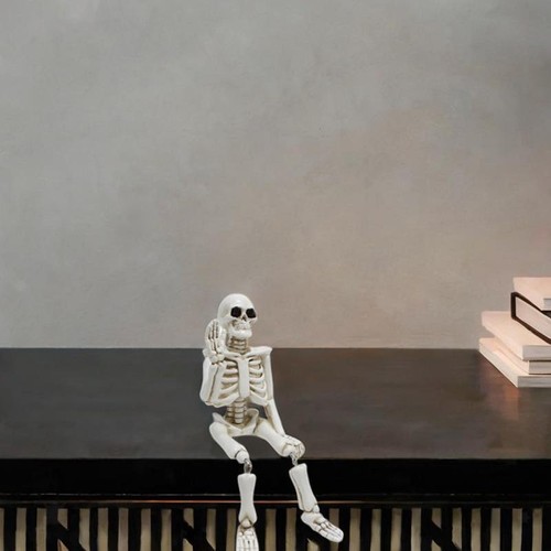 Figurine squelette agitant - , une