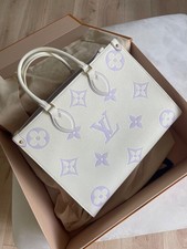 Louis Vuitton  on the go mm Crème/lilas rare coloris neuf