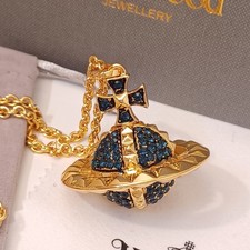 Vivienne Westwood- Grand collier 3D "Mayfair" or et cristaux bleus foncés.