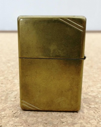 Briquet huile zippo - à,