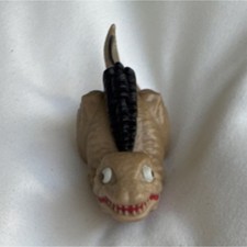 Small Tan Dinosaur Figurine