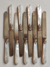 Hénin & Cie - Lot de 9 couteaux lames et Viroles Vermeil Manches en Nacre P:417g