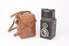 Appareil photo TLR Aiglon avec objectif Angénieux type U1 f/4.5 - 75mm. Atoms