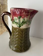 Ancien pichet en barbotine