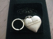 PORTE CLES PUBLICITAIRE " LAURENT PERRIER "  " COEUR OR "  CHAMPAGNE