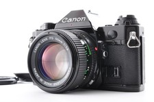 Appareil photo reflex argentique CLA'd Canon AE-1 Program noir / FD 50mm f1.4...