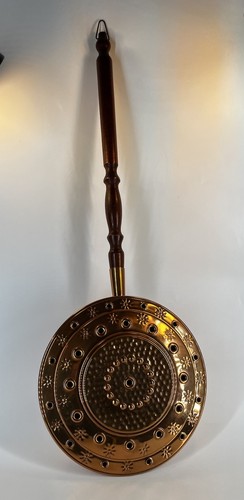 Bassinoire chaufferette à - -,