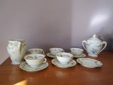 Service à thé de Limoges  fabrique royal signé D'Artois décor floral et dorure