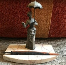 Ancien porte plume statue