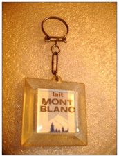 B09 / VINTAGE ANCIEN PORTE CLÉS INCLUSION lait mont blanc CONCENTRE SUCRE 4 X 4