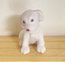 Mini figurine chien assis
