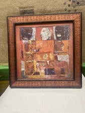 Tableau différents visage cadre bois africain ?