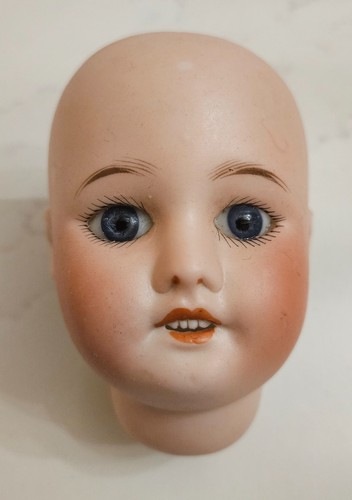 Tête poupée ancienne en - de,
