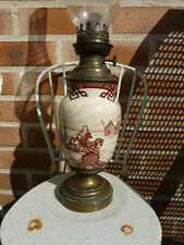 lampe à pétrole en faience ancienne et pied laiton décor attelage de chevaux