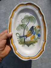 PLAT EN FAIENCE CUL NOIR DU