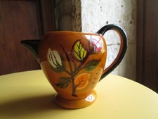 Très joli pichet en faïence
