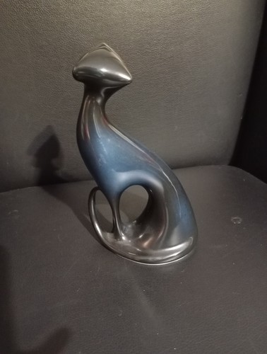 Vintage figurine sitting - of,