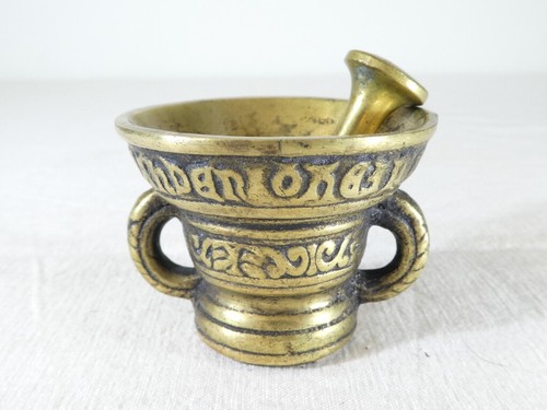 Ancien mortier bronze - en,