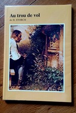 Livre au trou de vol - H