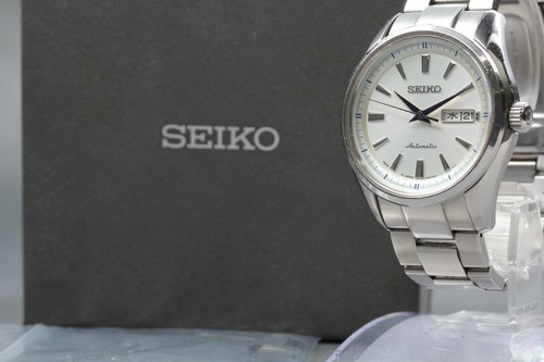 Presque comme neuve montre - comme, neuve]