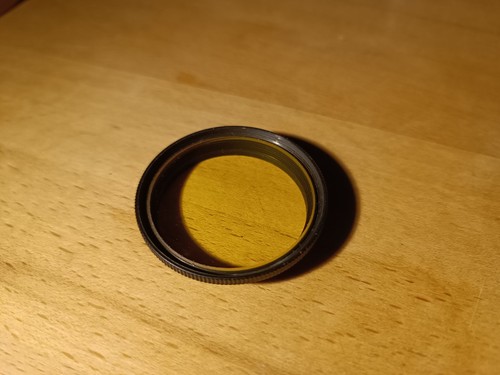 Filtre jaune pour objectif