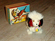 Jouet mécanique ancien à clé automate chien sautillant avec sa boîte