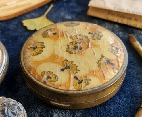 Poudrier métal coty à - en,