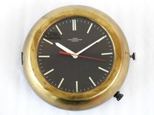 Horloge murale esclave